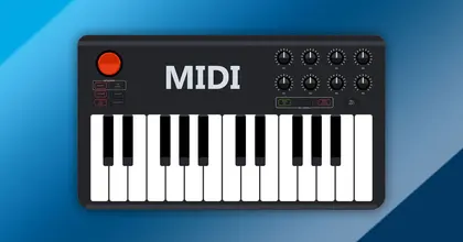 Midi keyboard in front of blue background